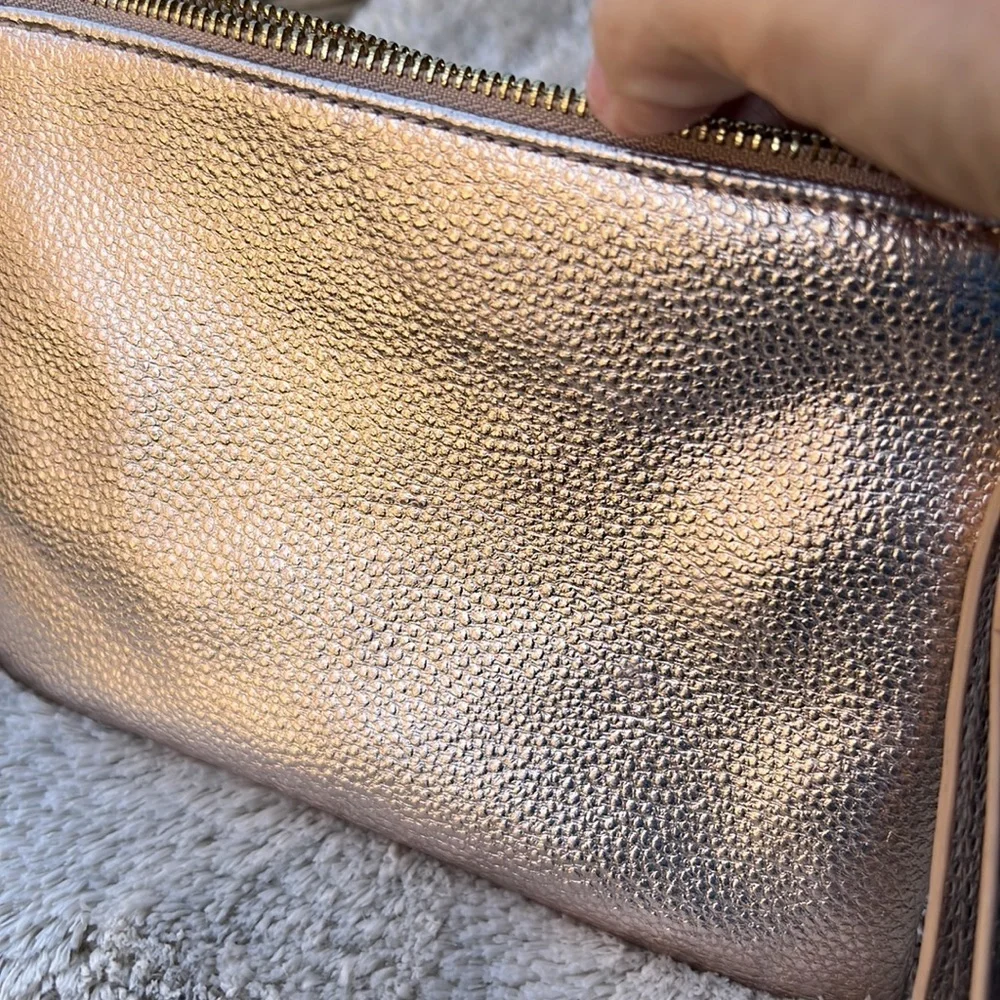 Francesca’s Rose Gold Clutch Wristlet